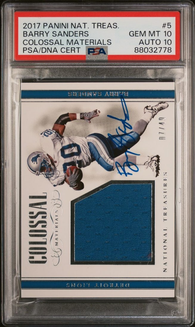 2017 Panini National Treasures Barry Sanders Signed Card PSA 10: 2017 Panini National Treasures Barry Sanders Signed Card PSA 10 This remarkable collectible features a 2017 Panini National Treasures Colossal Materials #5 card, signed by the legendary Barry Sanders.