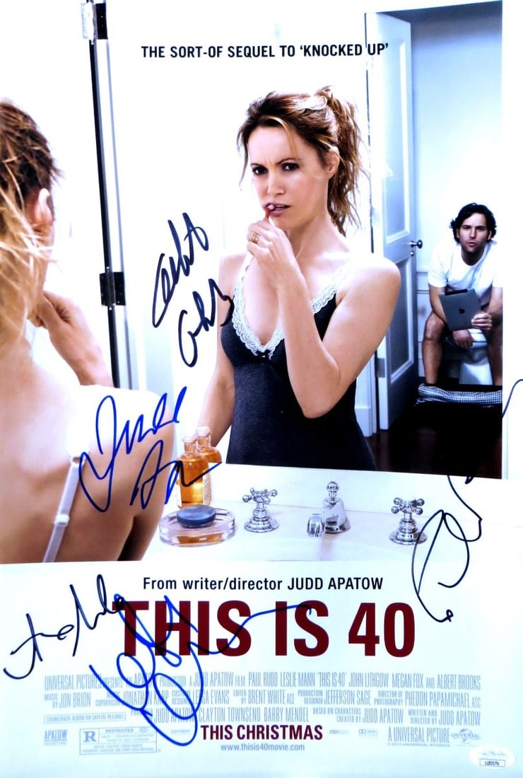 This is 40 Cast Signed 12x18 Photo Apatow Rudd Mann Brooks JSA: This is 40 Cast Signed 12x18 Photo Apatow Rudd Mann Brooks JSA This is a stunning 12x18 photograph from the film 'This is 40', featuring the cast's authentic signatures. The photo is signed by notable