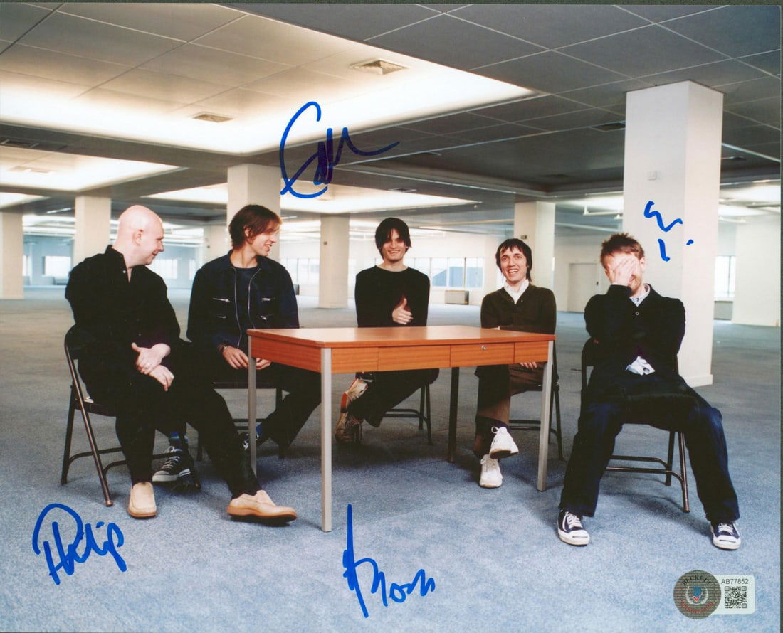 Radiohead Signed 8x10 Photo by Yorke O'Brien Greenwood Selway BAS #AB77852: Radiohead Signed 8x10 Photo by Yorke O'Brien Greenwood Selway BAS #AB77852 This 8x10 photo features the autographs of Thom Yorke, Ed O'Brien, Colin Greenwood, and Philip Selway, members of the iconic