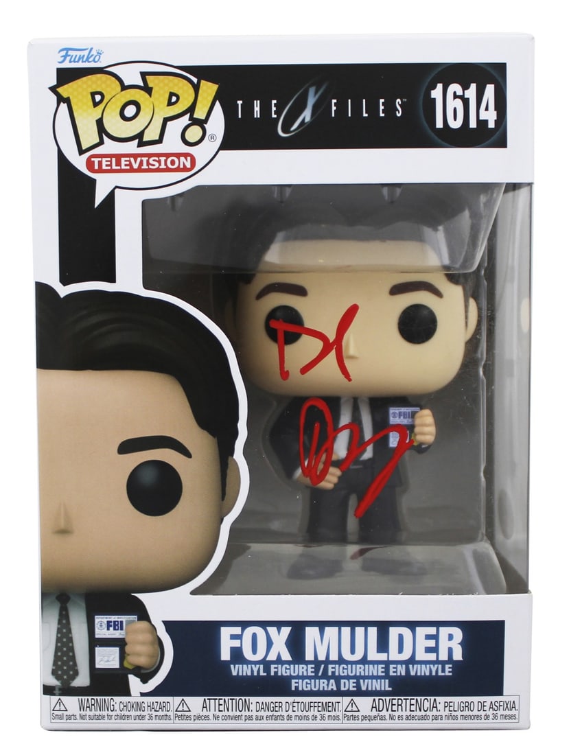 David Duchovny Autographed Fox Mulder Funko Pop JSA Authenticated: David Duchovny Autographed Fox Mulder Funko Pop JSA Authenticated This pre-owned Fox Mulder #1614 Funko Pop Vinyl Figure from The X-Files has been personally signed by David Duchovny. The autograph is