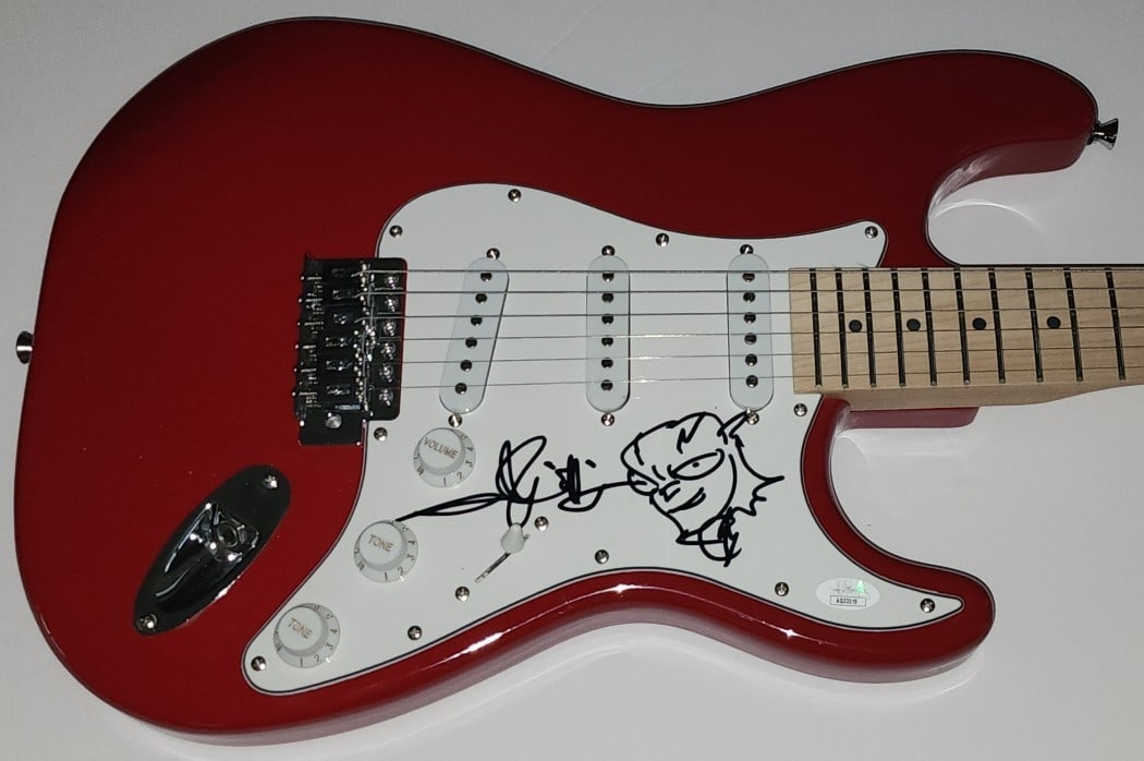 Andy Muschietti Signed Guitar with The Flash Sketch JSA Authenticated: Andy Muschietti Signed Guitar with The Flash Sketch JSA Authenticated This is an authentic Andy Muschietti signed guitar featuring a unique sketch of The Flash. The guitar is accompanied by a JSA auth