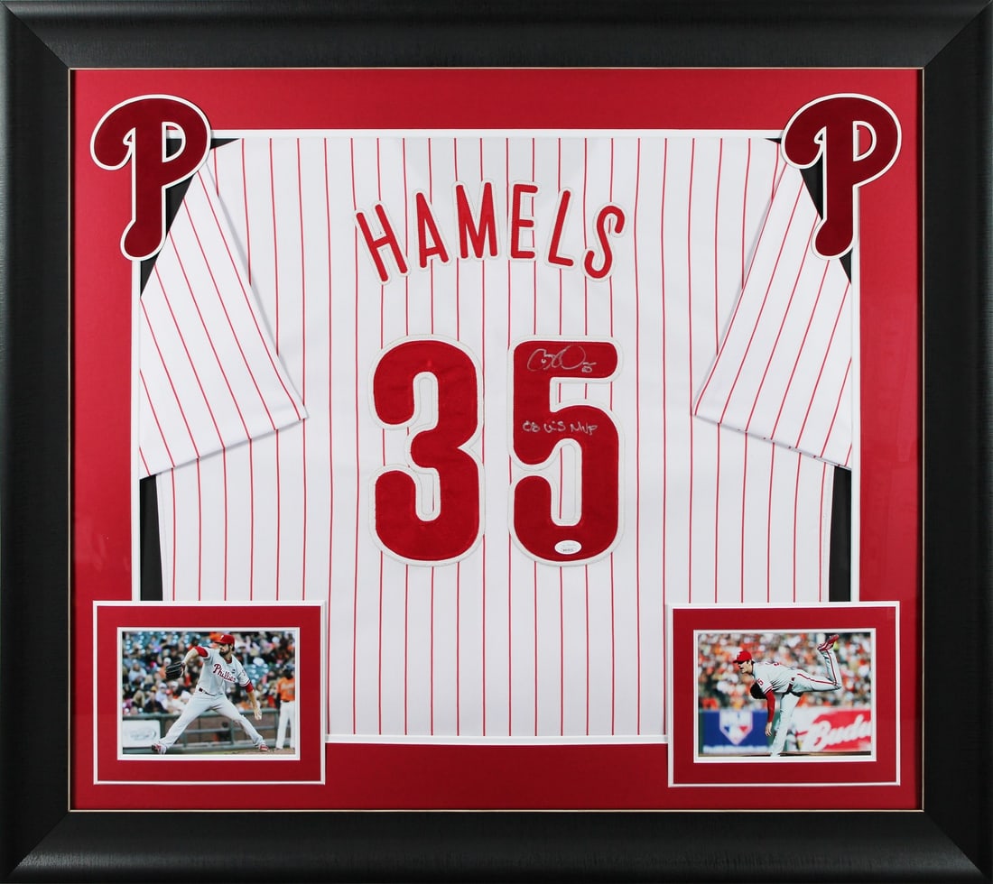 Cole Hamels Signed Framed Jersey 08 WS MVP JSA Authenticated: Cole Hamels Signed Framed Jersey 08 WS MVP JSA Authenticated Celebrate the legacy of Cole Hamels with this original signed white pinstripe pro-style jersey, framed and featuring the inscription "08 WS