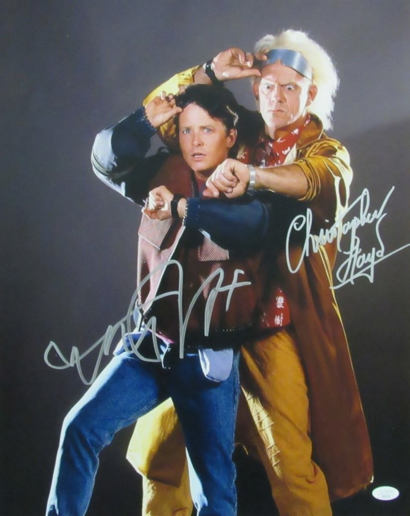 Michael J Fox Christopher Lloyd Signed 16x20 Photo Back to Future JSA Certified: Michael J Fox Christopher Lloyd Signed 16x20 Photo Back to Future JSA Certified This is an autographed 16x20 photograph featuring Michael J. Fox and Christopher Lloyd from the iconic film "Back to the