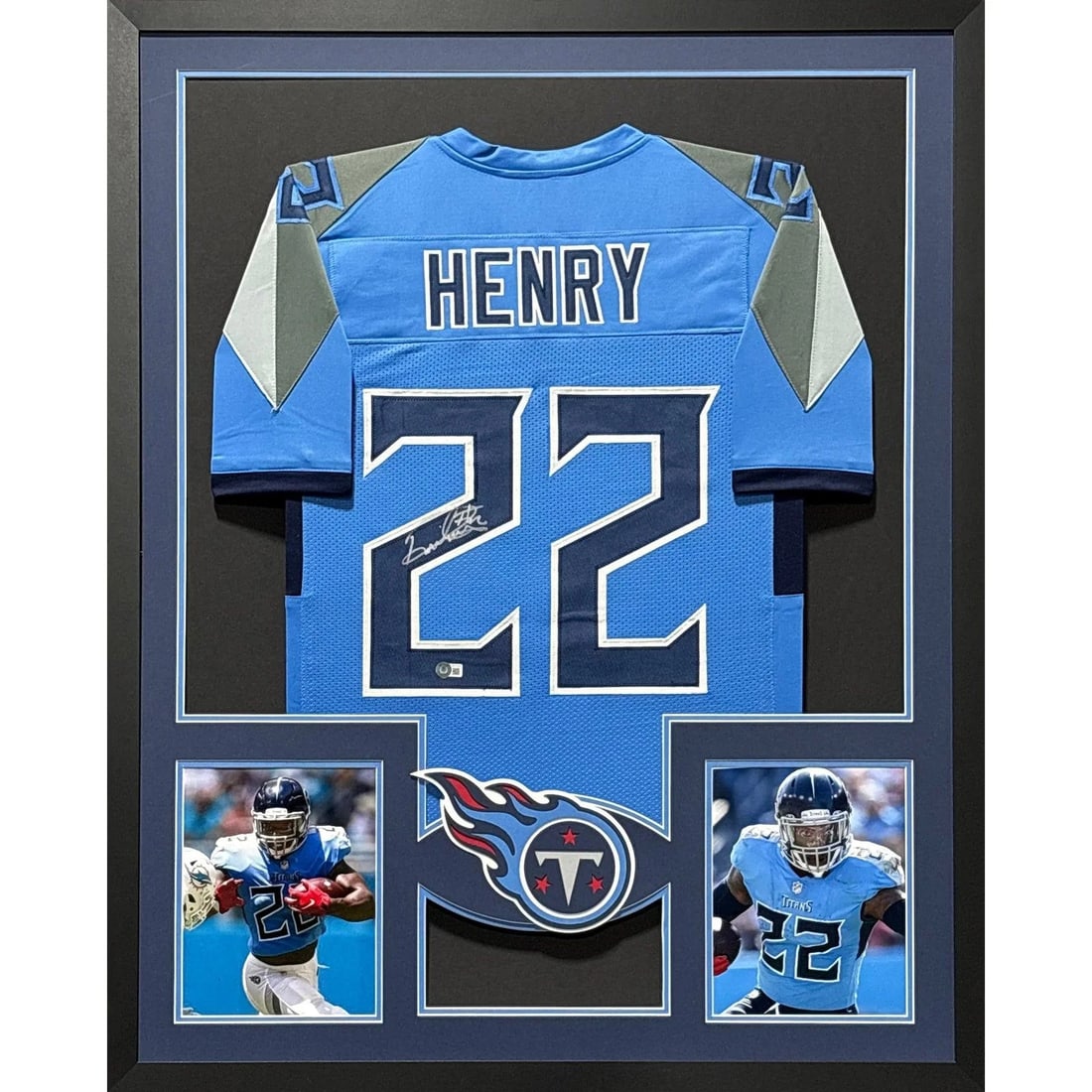 Framed Tennessee Titans Blue Jersey Signed by Derrick Henry Beckett Authenticated: Framed Tennessee Titans Blue Jersey Signed by Derrick Henry Beckett Authenticated This framed Tennessee Titans jersey is autographed by Derrick Henry and authenticated by Beckett. The display features