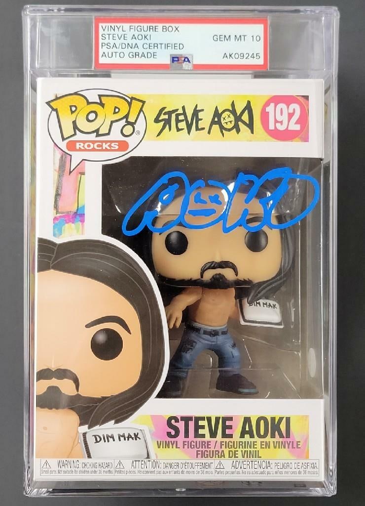 Funko POP DJ Dim Mak Signed by Steve Aoki PSA 10 Gem Mint: Funko POP DJ Dim Mak Signed by Steve Aoki PSA 10 Gem Mint This original Funko POP figure features Steve Aoki as DJ Dim Mak and has been personally autographed by Steve Aoki. The autograph is authentic