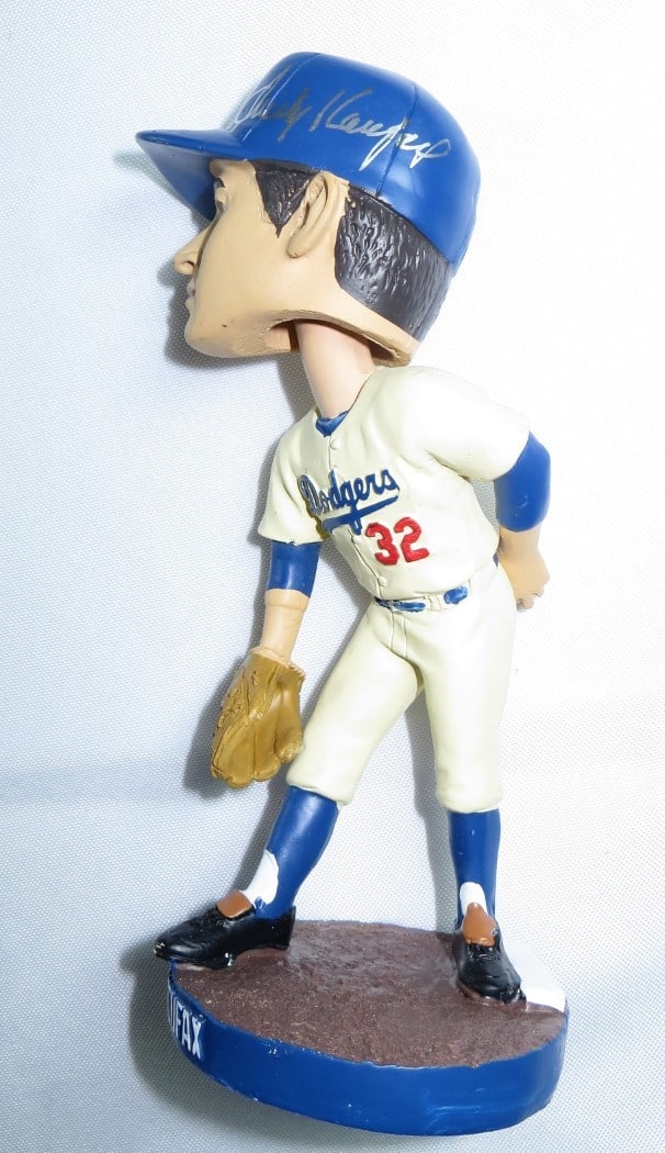 Sandy Koufax Autographed Bobblehead Dodgers 2024 JSA Authentic: Sandy Koufax Autographed Bobblehead Dodgers 2024 JSA Authentic Celebrate the legacy of baseball legend Sandy Koufax with this authentic autographed bobblehead. This collectible features Koufax in Los