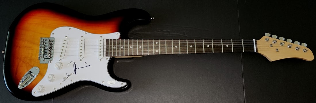 Emmylou Harris Autographed Electric Guitar JSA Authenticated: Emmylou Harris Autographed Electric Guitar JSA Authenticated This is an authentic electric guitar autographed by country music legend Emmylou Harris. The signature has been verified by James Spence Au