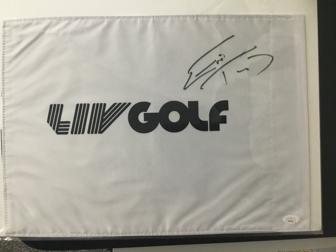 Eric Trump Signed LIV Golf #18 Pin Flag JSA Authenticated: Eric Trump Signed LIV Golf #18 Pin Flag JSA Authenticated Celebrate your love for golf with this officially licensed LIV Golf #18 pin flag, featuring the signature of PGA/LIV star Eric Trump. The auto