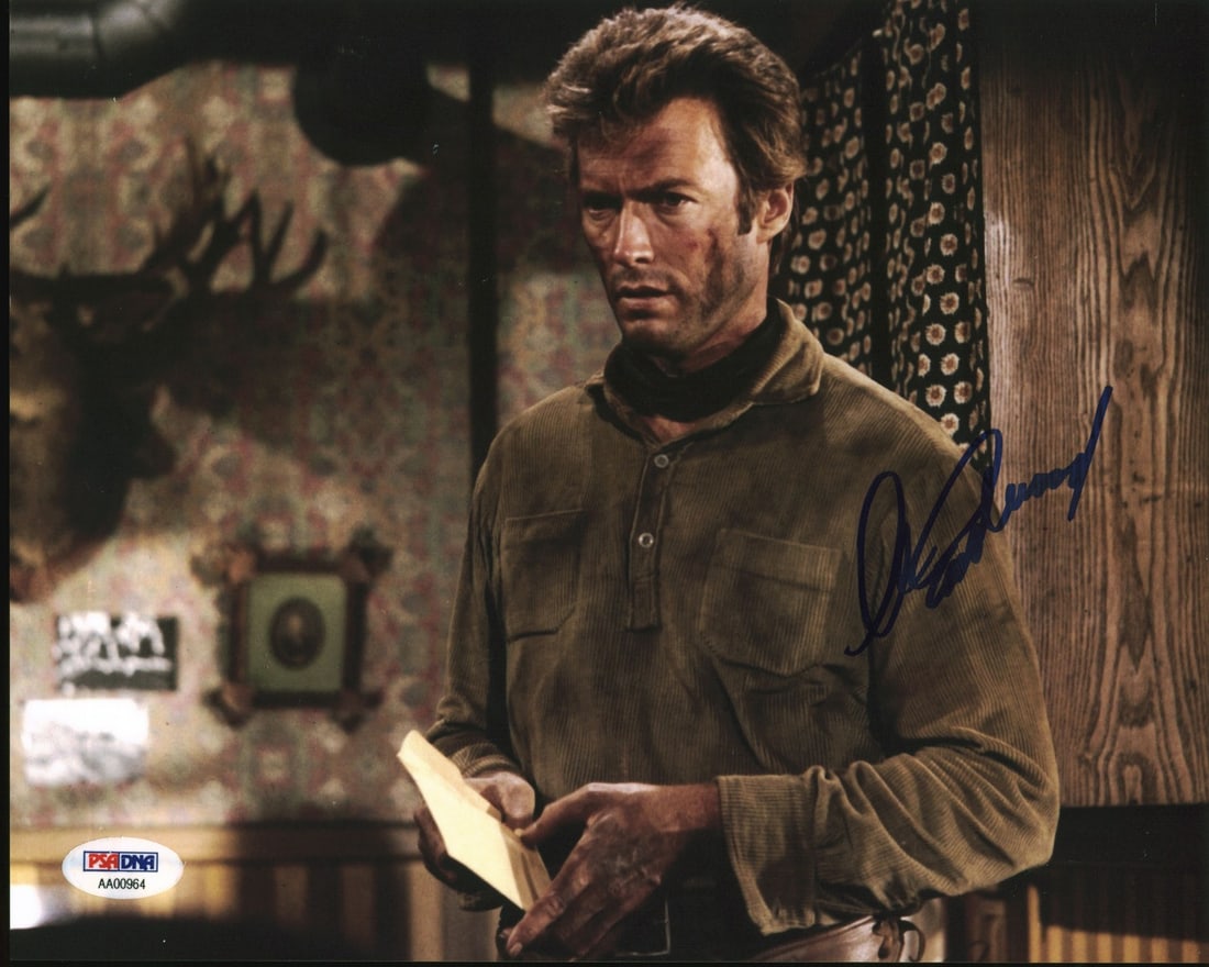 Clint Eastwood Hang 'Em High 8x10 Photo Signed PSA/DNA Certified: Clint Eastwood Hang 'Em High 8x10 Photo Signed PSA/DNA Certified This authentic 8x10 photo features Clint Eastwood, personally signed in a striking display of his role in "Hang 'Em High." The signatur