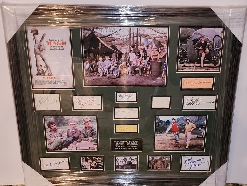 MASH Cast Autographed Photo Display Beckett Authenticated Original: MASH Cast Autographed Photo Display Beckett Authenticated Original This is an original autographed photo display from the film MASH, featuring signatures from Donald Sutherland, Elliot Gould, Sally Ke