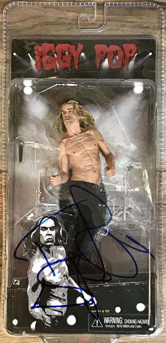 Iggy Pop Signed 2011 NECA Limited Edition Punk Rock Figure: Iggy Pop Signed 2011 NECA Limited Edition Punk Rock Figure This limited edition Iggy Pop figure from NECA is a must-have for punk rock enthusiasts. Autographed by the legendary Iggy Pop himself in blu