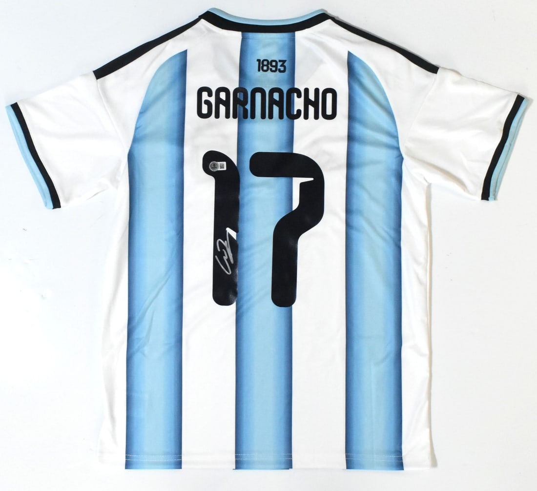 Argentina Home Jersey Signed by Alejandro Garnacho Beckett Hologram: Argentina Home Jersey Signed by Alejandro Garnacho Beckett Hologram This is a pre-owned Argentina home soccer jersey autographed by Alejandro Garnacho, featuring his number 17. The jersey is an origin