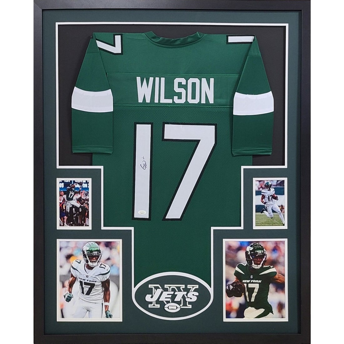Garrett Wilson Autographed Framed Jersey JSA New York Jets: Garrett Wilson Autographed Framed Jersey JSA New York Jets This is a framed, autographed jersey of Garrett Wilson, showcasing his affiliation with the New York Jets. The jersey is authenticated by JSA