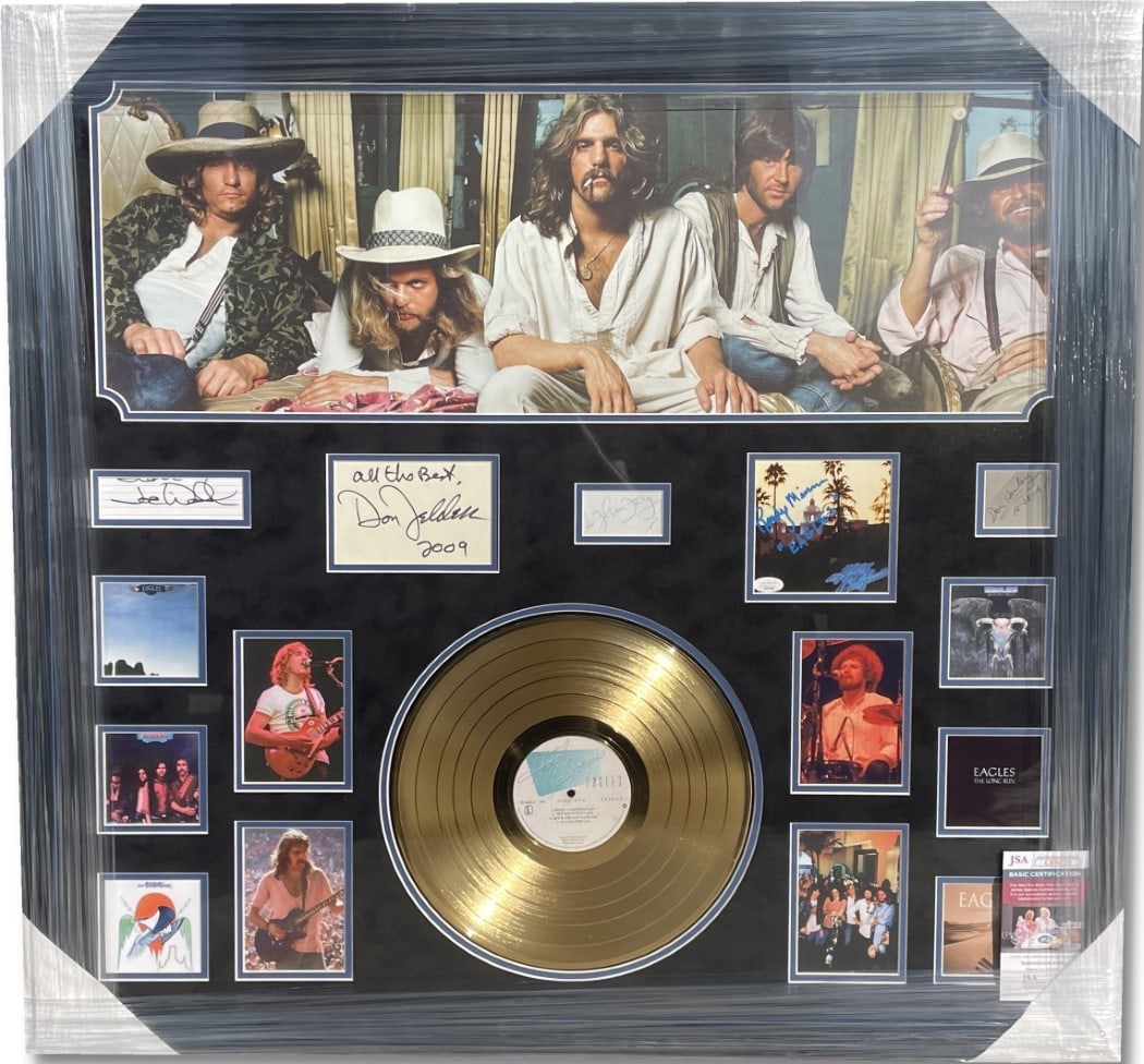Custom Framed Eagles Band Autograph Display With JSA Authentication: Custom Framed Eagles Band Autograph Display With JSA Authentication This custom-framed display features authentic autographed cuts from The Eagles band members, including Don Henley, Glenn Frey, Joe W