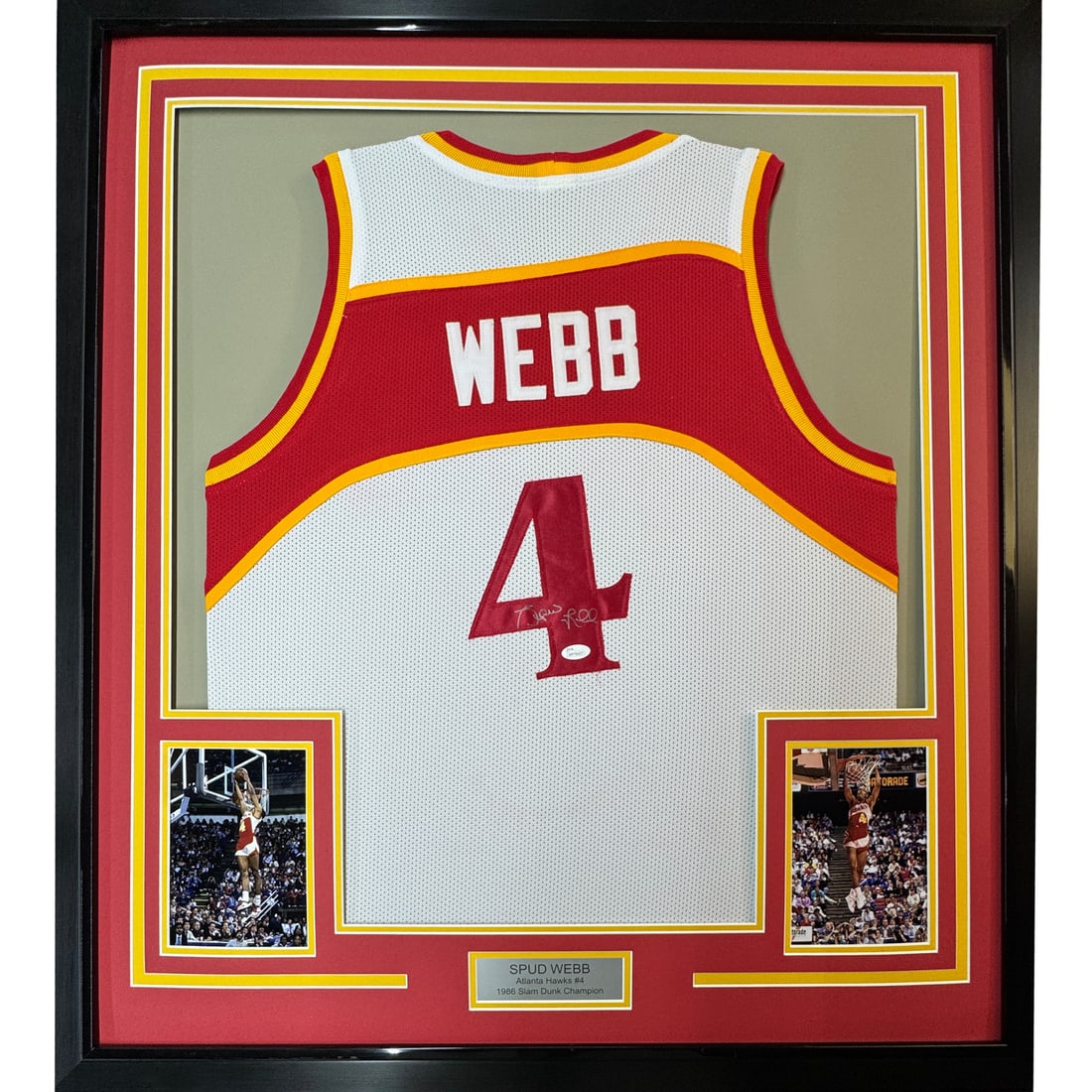 Framed Spud Webb Autographed Atlanta Hawks Jersey with JSA COA: Framed Spud Webb Autographed Atlanta Hawks Jersey with JSA COA This professionally framed and matted item features an autographed Spud Webb jersey from the Atlanta Hawks, perfect for any basketball fa