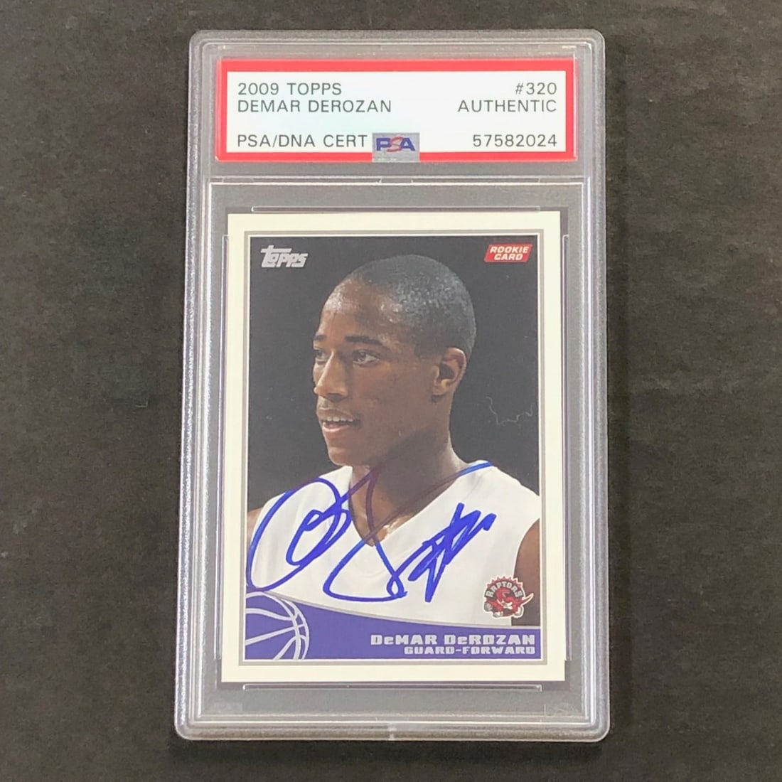 2009-10 Topps #320 DeMar DeRozan Signed Card PSA Authenticated Raptors: 2009-10 Topps #320 DeMar DeRozan Signed Card PSA Authenticated Raptors This is a 2009-10 Topps #320 basketball card featuring DeMar DeRozan, a prominent player for the Toronto Raptors. The card is sig