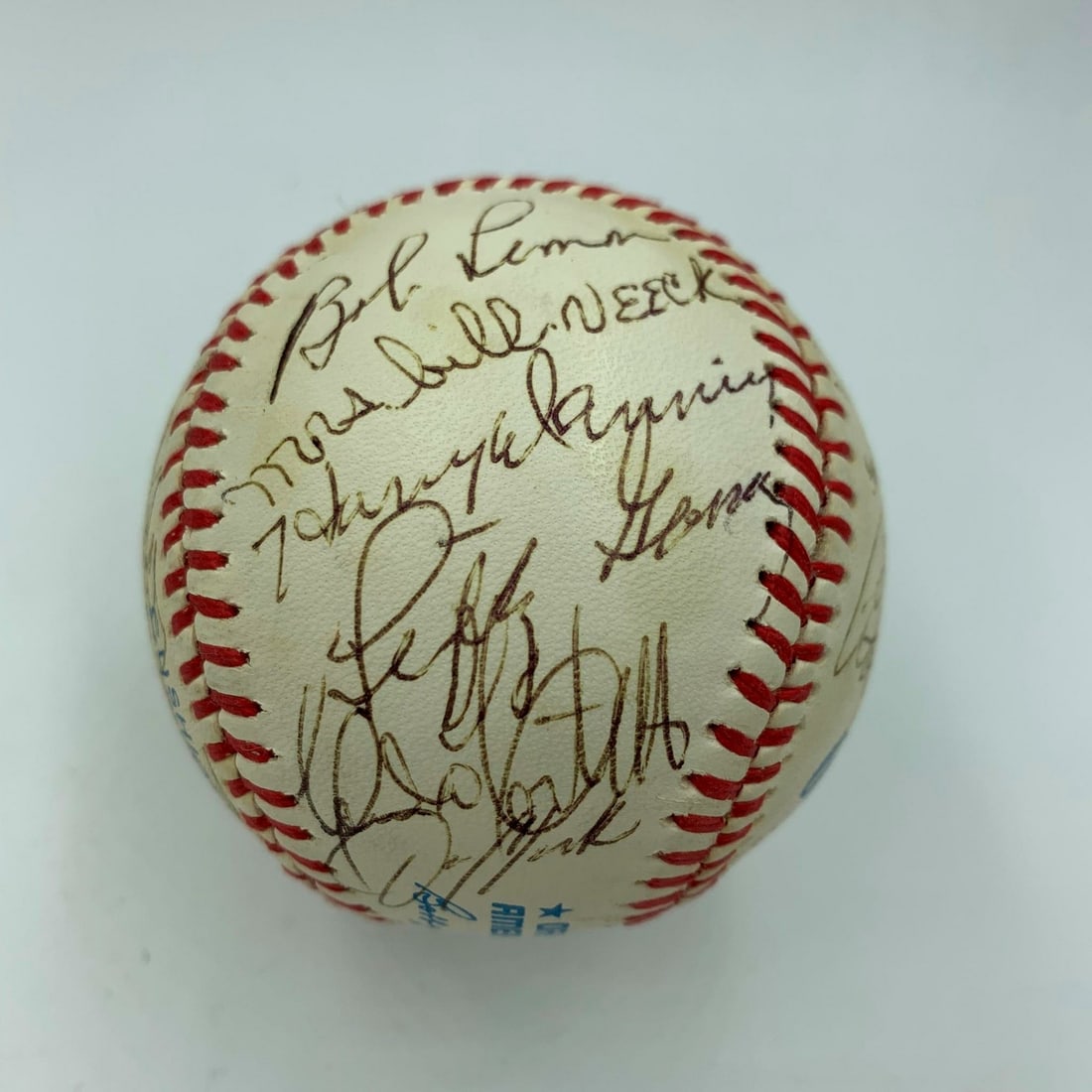 Cleveland Indians Legends Signed Baseball with 26 Autographs JSA COA: Cleveland Indians Legends Signed Baseball with 26 Autographs JSA COA This official American League baseball is a remarkable collector's item featuring the signatures of 26 legendary Cleveland Indians