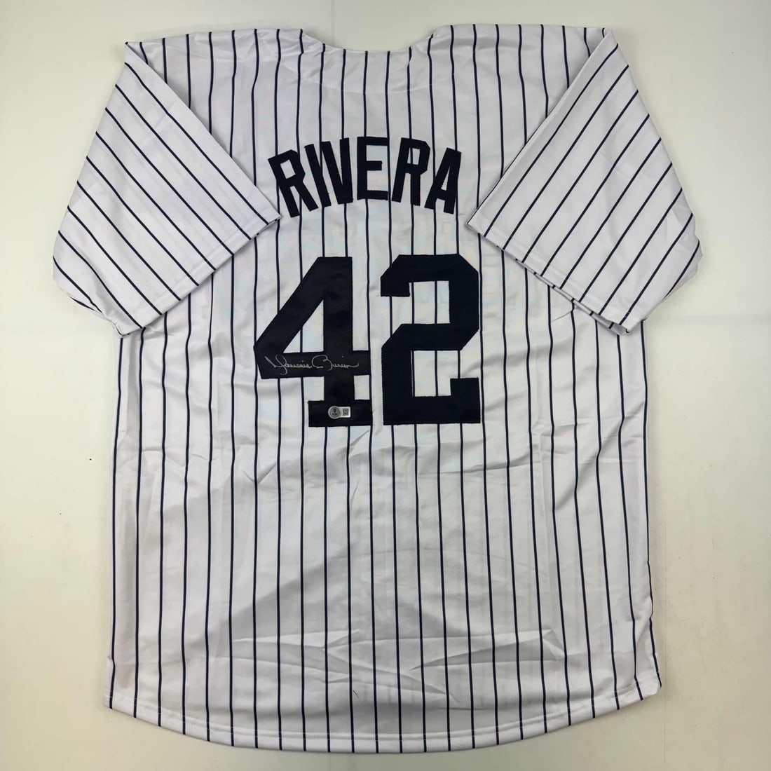 Mariano Rivera Signed New York Yankees Pinstripe Jersey JSA Authenticated: Mariano Rivera Signed New York Yankees Pinstripe Jersey JSA Authenticated Celebrate the legacy of Mariano Rivera with this authentic autographed New York Yankees pinstripe baseball jersey. This custom