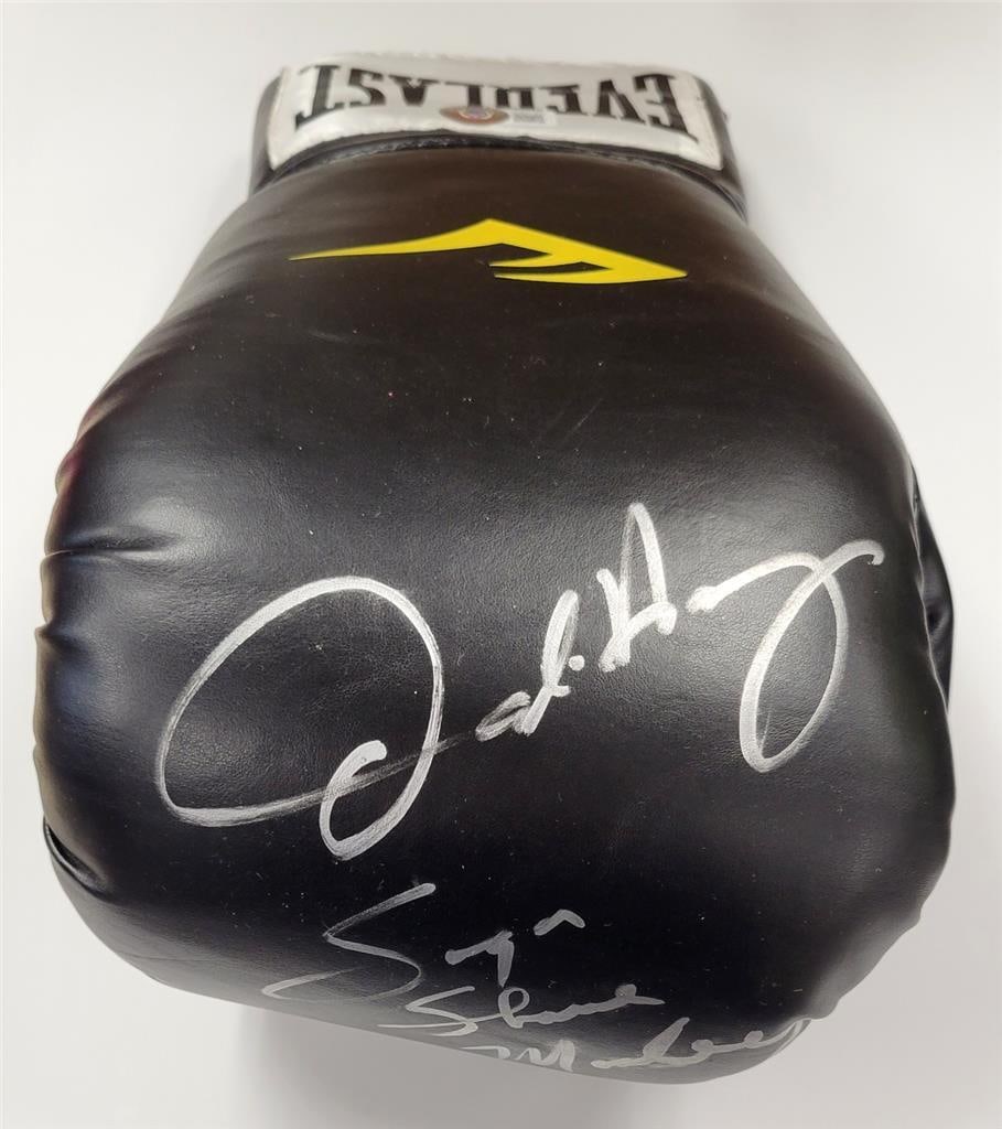Oscar De La Hoya Sugar Shane Mosley Signed Boxing Glove BAS Certified: Oscar De La Hoya Sugar Shane Mosley Signed Boxing Glove BAS Certified This is an original boxing glove signed by both Oscar De La Hoya and Sugar Shane Mosley, authenticated by Beckett Authentication S