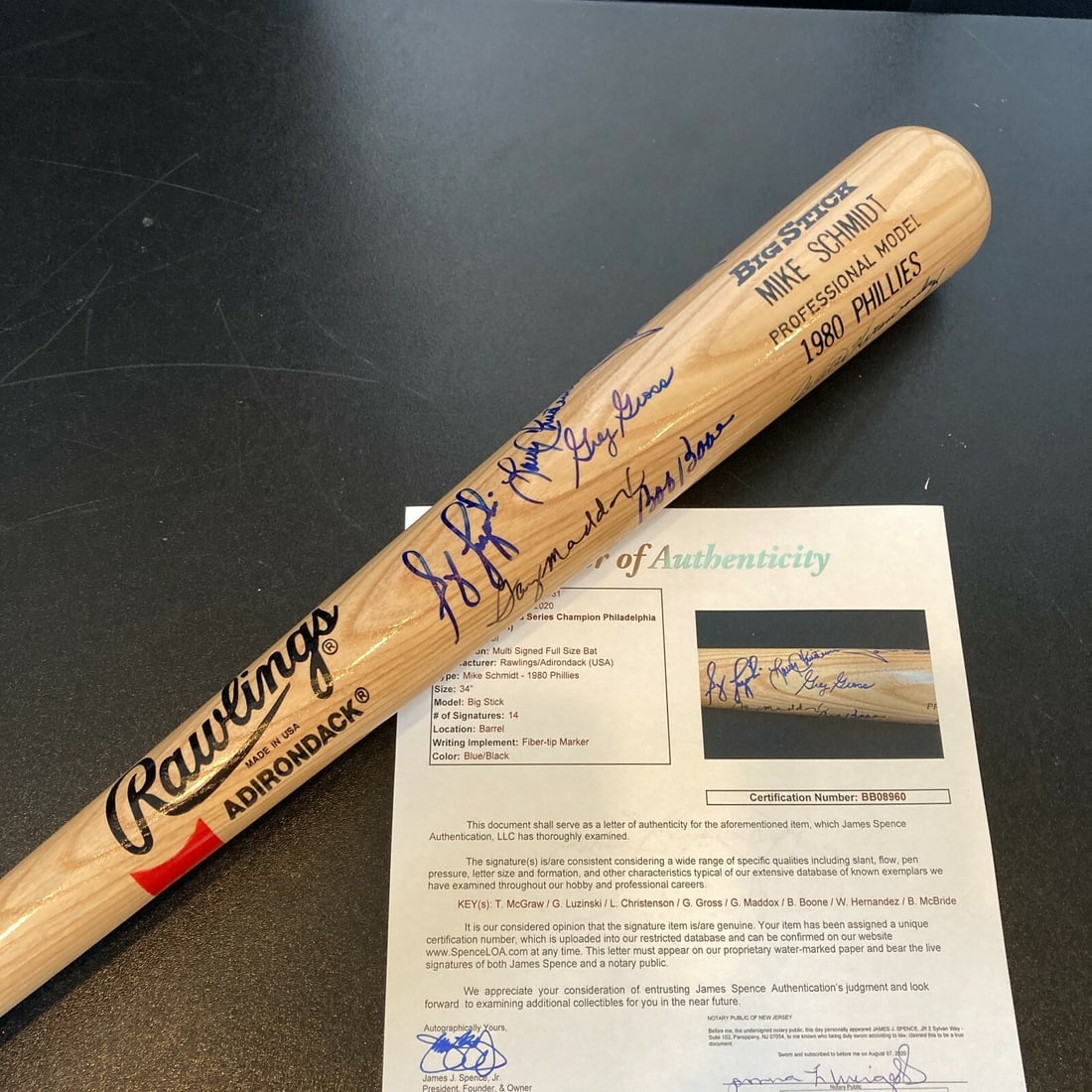 1980 Phillies Team Signed Bat with 14 Autographs JSA COA: 1980 Phillies Team Signed Bat with 14 Autographs JSA COA Celebrate the legacy of the 1980 Philadelphia Phillies with this original team-signed bat. This Rawlings-Adirondack Mike Schmidt model bat, bea