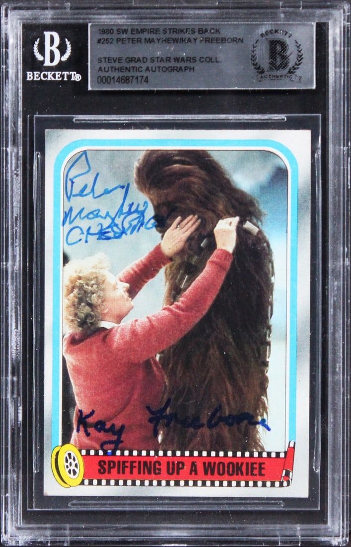 Star Wars ESB Card #252 Signed by Peter Mayhew and Kay Freeborn BAS Authenticated: Star Wars ESB Card #252 Signed by Peter Mayhew and Kay Freeborn BAS Authenticated This 1980 Star Wars: The Empire Strikes Back #252 card features autographs from Peter Mayhew and Kay Freeborn, includi