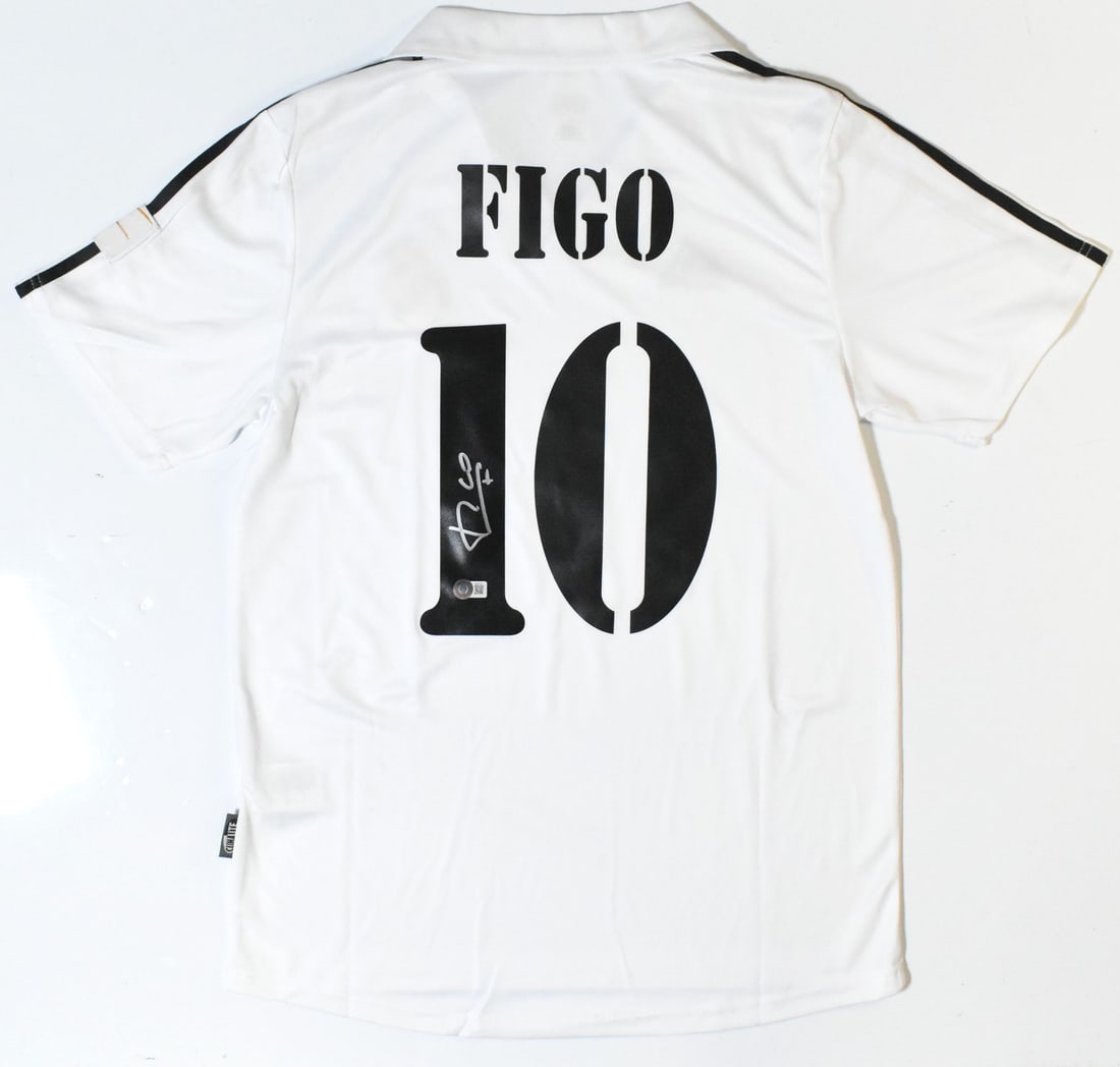Luis Figo Signed Real Madrid Home Jersey Number 10 Beckett Hologram: Luis Figo Signed Real Madrid Home Jersey Number 10 Beckett Hologram This Real Madrid CF home soccer jersey features the autograph of Luis Figo and displays his iconic number 10. The jersey is an origi