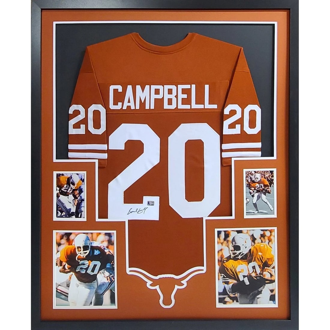 Earl Campbell Signed Framed Jersey with Authentication: Earl Campbell Signed Framed Jersey with Authentication This autographed Earl Campbell framed jersey is a remarkable collectible for any sports fan. Authenticated by Earl Campbell's company, it feature