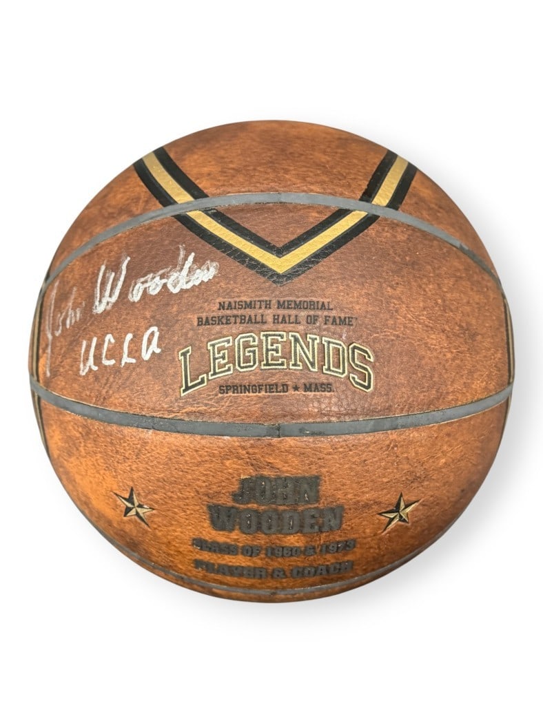 Custom Legends Basketball Signed by John Wooden for UCLA Bruins with PSA Authentication: Custom Legends Basketball Signed by John Wooden for UCLA Bruins with PSA Authentication This is a custom Legends basketball featuring the signature of John Wooden, the legendary coach of the UCLA Brui