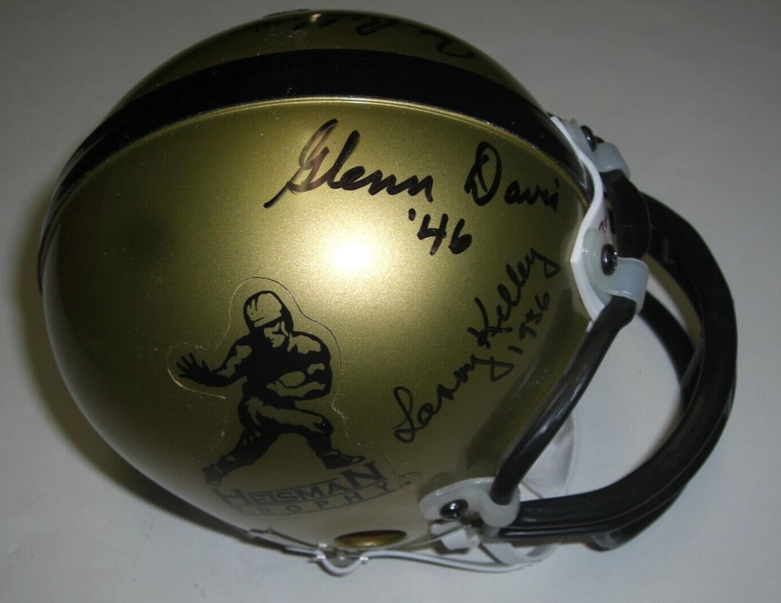 PSA DNA Signed Mini Helmet Kelley Davis Bellino Heisman Football Collectible: PSA DNA Signed Mini Helmet Kelley Davis Bellino Heisman Football Collectible This is a pre-owned mini football helmet signed by Larry Kelley (Yale, Heisman 1936), Glenn Davis, and Joe Bellino. The hel