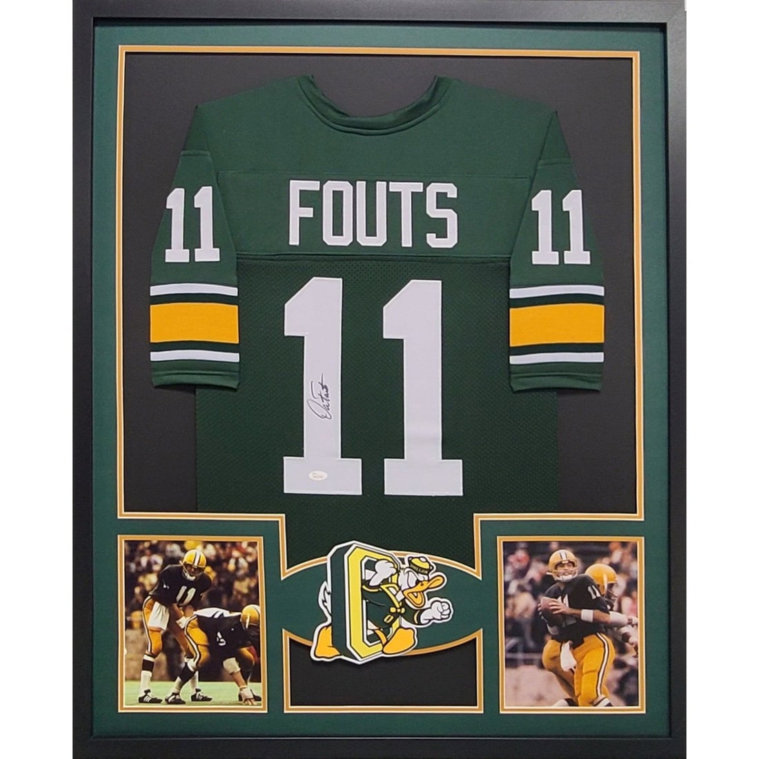 Framed Oregon Ducks Jersey Signed by Dan Fouts with JSA Authentication: Framed Oregon Ducks Jersey Signed by Dan Fouts with JSA Authentication This framed Oregon Ducks jersey is autographed by Dan Fouts and comes certified authentic by JSA, featuring a tamper-proof sticke