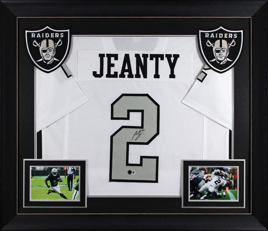 Ashton Jeanty Signed Las Vegas Raiders Framed Jersey BAS Witnessed: Ashton Jeanty Signed Las Vegas Raiders Framed Jersey BAS Witnessed Celebrate the dynamic play of Ashton Jeanty with this authentic signed white Color Rush Pro Style framed jersey from the Las Vegas Ra