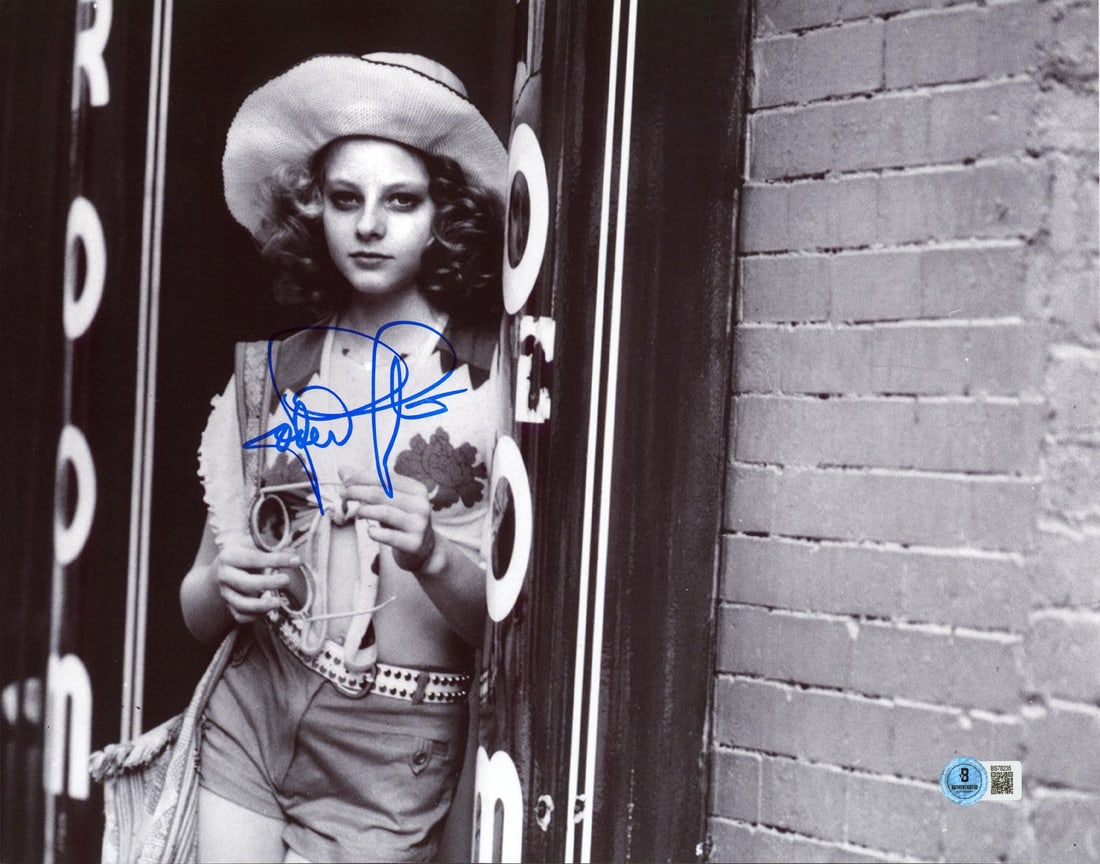 Jodie Foster Signed Taxi Driver 11x14 Photo BAS Authenticated: Jodie Foster Signed Taxi Driver 11x14 Photo BAS Authenticated This authentic 11x14 photograph features the signature of Jodie Foster, renowned for her role in the iconic film 'Taxi Driver.' Each photo