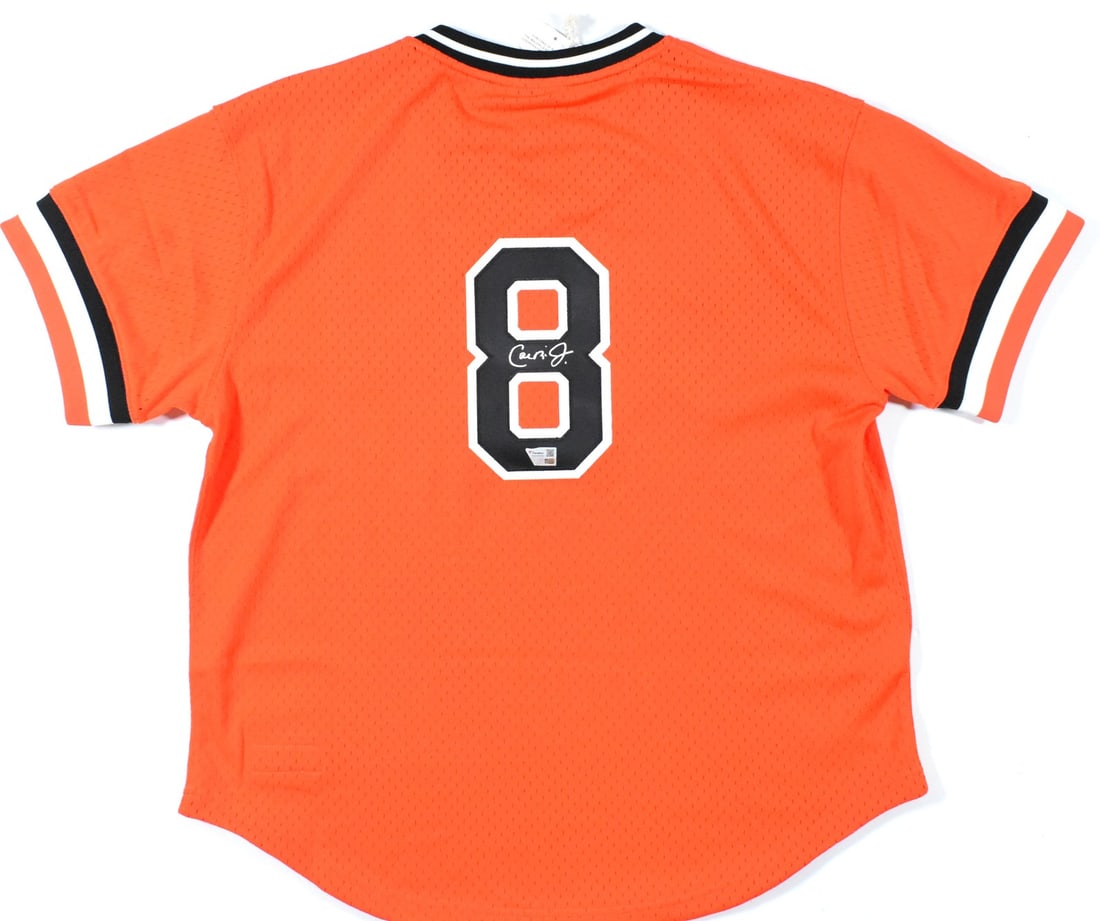 Signed Mitchell and Ness Baltimore Orioles Jersey by Cal Ripken Jr Original: Signed Mitchell and Ness Baltimore Orioles Jersey by Cal Ripken Jr Original This is a pre-owned Baltimore Orioles Mitchell & Ness jersey autographed by Cal Ripken Jr. The jersey is an original item an