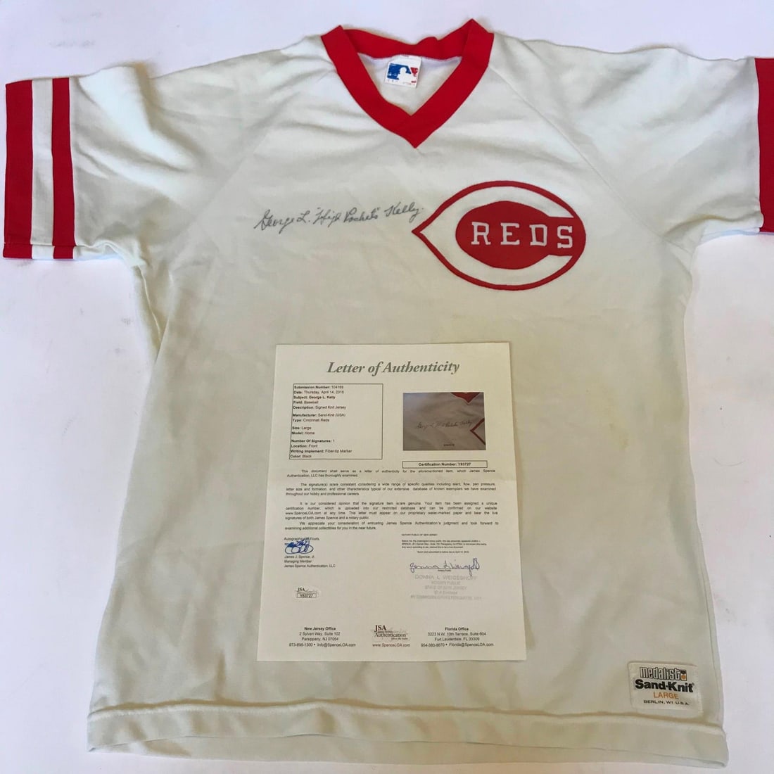 Rare George Kelly Signed Cincinnati Reds Jersey with JSA COA: Rare George Kelly Signed Cincinnati Reds Jersey with JSA COA This is a rare Cincinnati Reds jersey signed and inscribed by George Kelly, famously known as "High Pockets." It comes with a James Spence