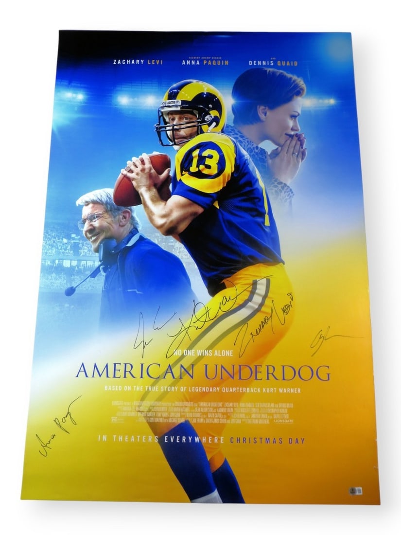 American Underdog Cast Signed 27x40 Poster Levi Paquin Warner Beckett Authenticated: American Underdog Cast Signed 27x40 Poster Levi Paquin Warner Beckett Authenticated This is an original 27" x 40" poster from the film 'American Underdog,' autographed by cast members Zachary Levi, An