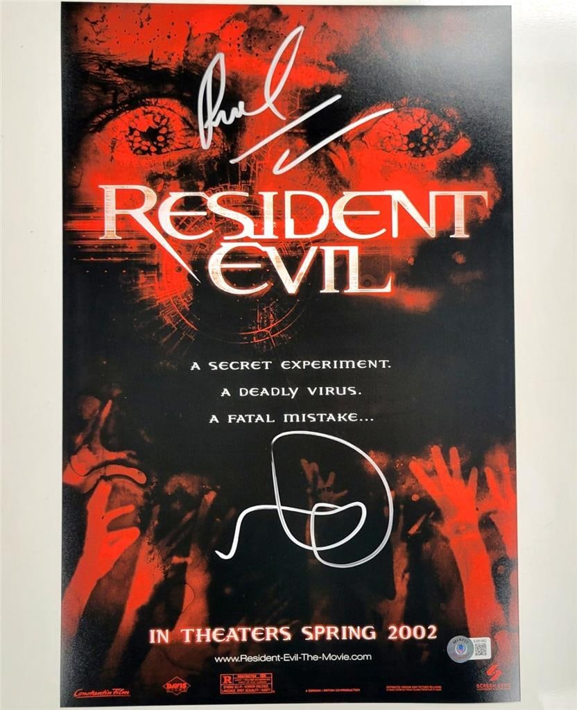 Milla Jovovich Signed Resident Evil 12x18 Photo Authenticated by Beckett: Milla Jovovich Signed Resident Evil 12x18 Photo Authenticated by Beckett This striking 12x18 photograph from the iconic movie Resident Evil features the signatures of Milla Jovovich and director Paul