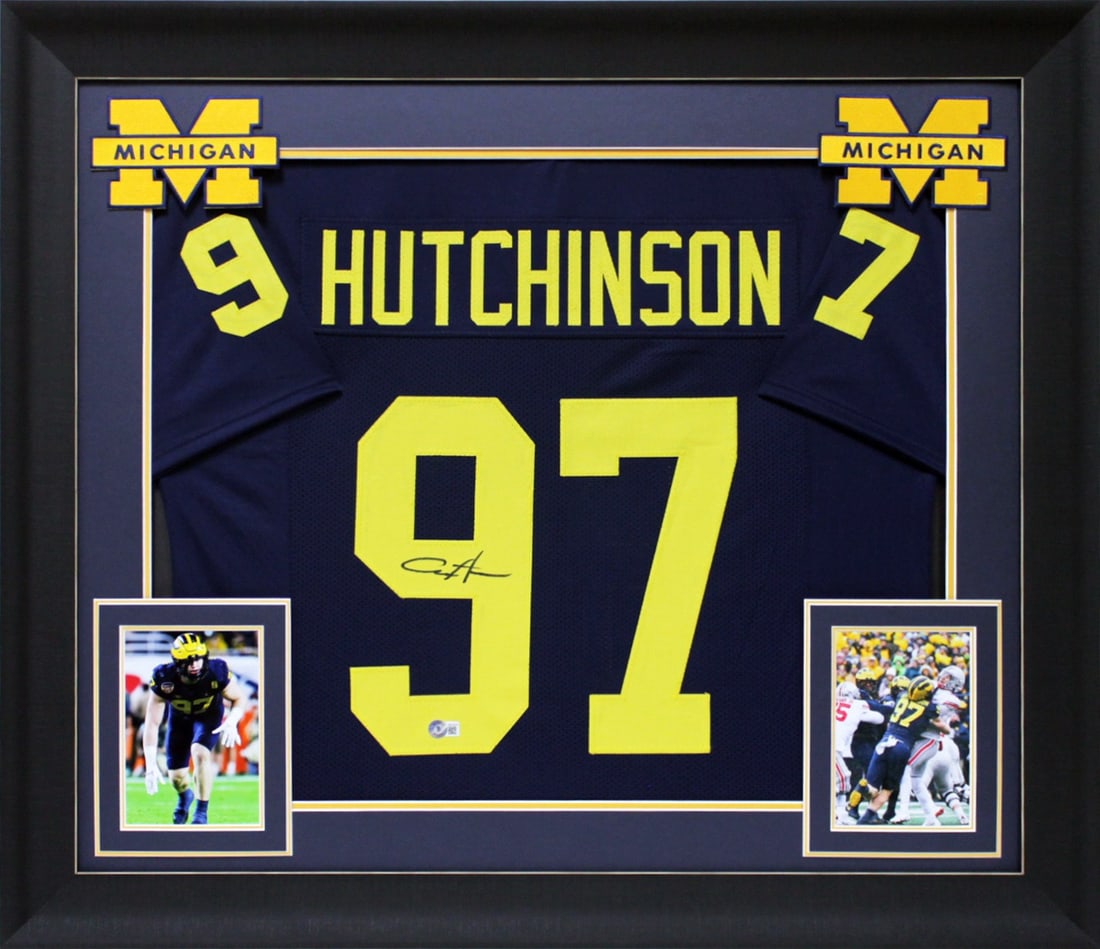 Aidan Hutchinson Signed Michigan Navy Blue Framed Jersey with BAS Authentication: Aidan Hutchinson Signed Michigan Navy Blue Framed Jersey with BAS Authentication This is an authentic, autographed navy blue Pro Style framed jersey of Aidan Hutchinson from the Michigan Wolverines. T
