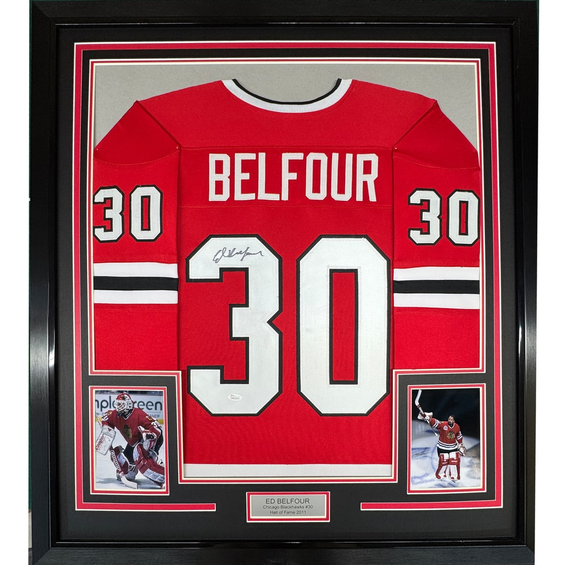Framed Ed Belfour Autographed Chicago Blackhawks Jersey with JSA COA: Framed Ed Belfour Autographed Chicago Blackhawks Jersey with JSA COA Celebrate your love for the Chicago Blackhawks with this stunning framed autographed Ed Belfour hockey jersey. This original jersey