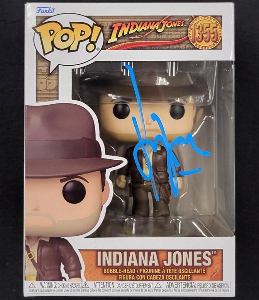 Indiana Jones Funko Pop 1355 Harrison Ford Autographed Figure Beckett Certified: Indiana Jones Funko Pop 1355 Harrison Ford Autographed Figure Beckett Certified This is an original Indiana Jones Funko Pop Figure #1355, signed by Harrison Ford. The autograph has been authenticated