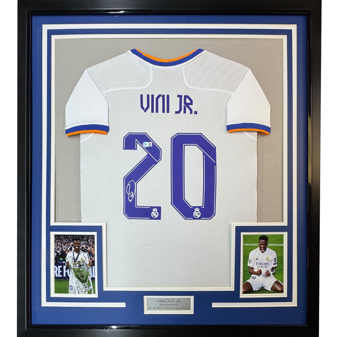 Framed Real Madrid Jersey Signed by Vinicius Jr. with BAS COA: Framed Real Madrid Jersey Signed by Vinicius Jr. with BAS COA This stunning framed jersey features a genuine autograph from Vinicius Jr., a standout player for Real Madrid in LaLiga. The jersey is pro