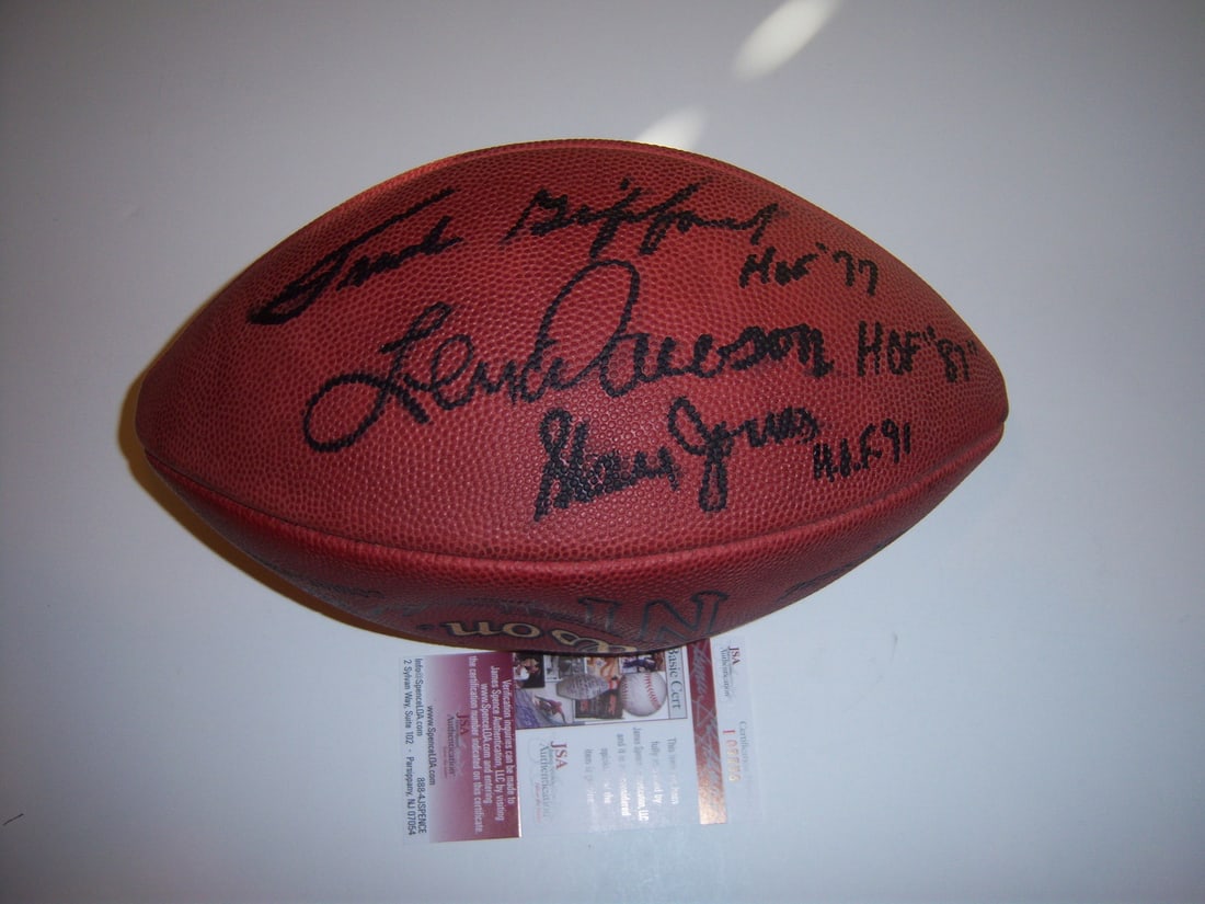 Frank Gifford Stan Jones Len Dawson Signed Game Football with JSA COA: Frank Gifford Stan Jones Len Dawson Signed Game Football with JSA COA This official game football is signed by legendary Hall of Fame players Frank Gifford, Stan Jones, and Len Dawson, making it a rem