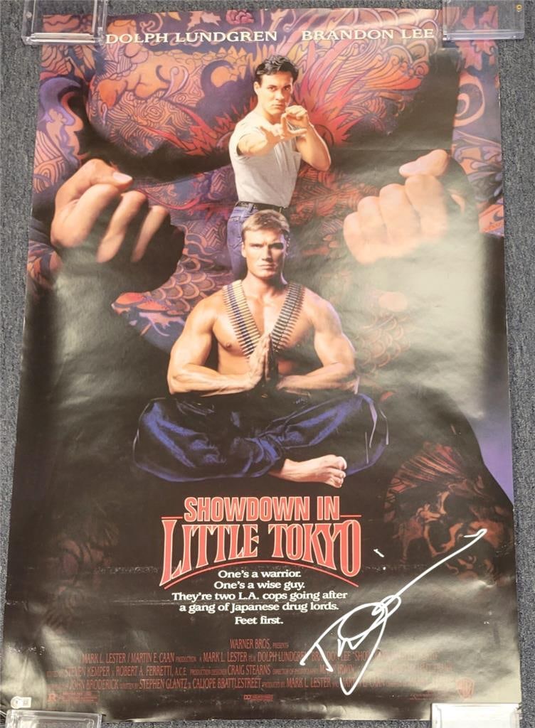 Dolph Lundgren Autographed Showdown in Little Tokyo Poster 27x40 Beckett Certified: Dolph Lundgren Autographed Showdown in Little Tokyo Poster 27x40 Beckett Certified This original 27x40 movie poster for 'Showdown in Little Tokyo' features a bold autograph from Dolph Lundgren, authen
