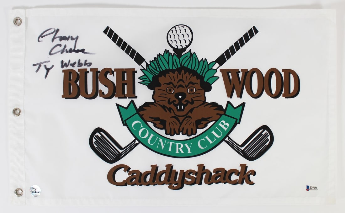 Chevy Chase Signed Caddyshack Flag with Ty Webb Inscription BAS #I47052: Chevy Chase Signed Caddyshack Flag with Ty Webb Inscription BAS #I47052 This Bushwood Country Club flag features the full name of Chevy Chase, along with his character name "Ty Webb" inscribed. The fl