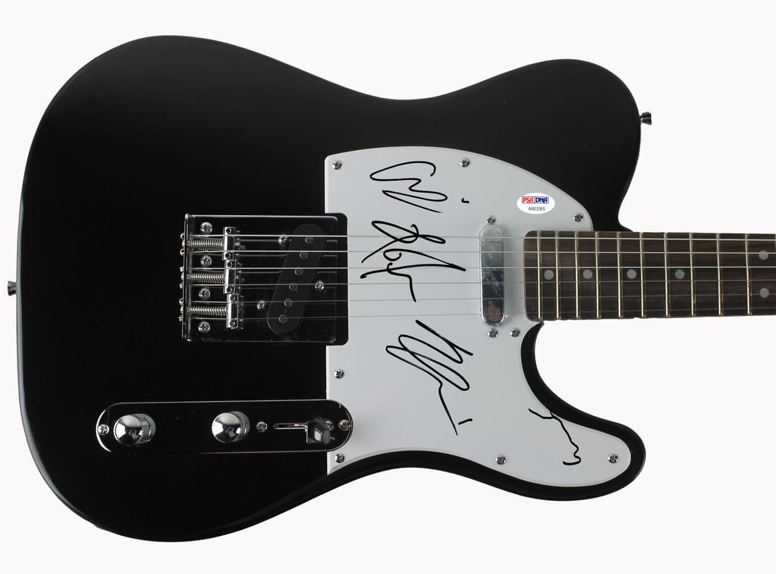 Autographed Guitar by X Ambassadors With PSA DNA COA: Autographed Guitar by X Ambassadors With PSA DNA COA This is a pre-owned guitar and guitar pick, personally signed by all four members of X Ambassadors: Sam Harris, Casey Harris, Noah Feldshuh, and Ad