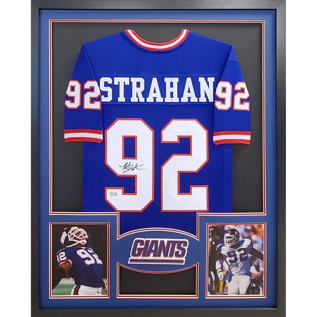 Michael Strahan Signed Framed Giants Rookie Jersey Beckett Authenticated: Michael Strahan Signed Framed Giants Rookie Jersey Beckett Authenticated Celebrate the legacy of Michael Strahan with this beautifully framed, autographed New York Giants rookie jersey. Authenticated