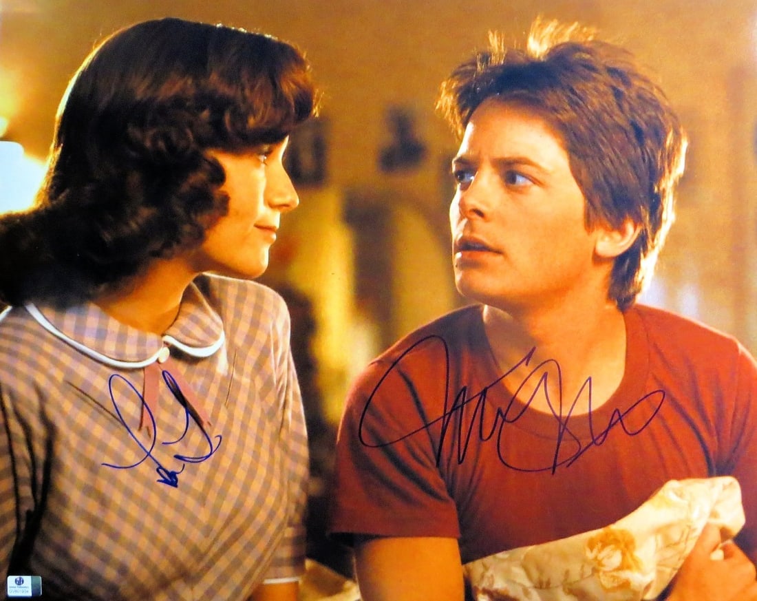 Michael J Fox Lea Thompson Dual Signed 16x20 Back to the Future Photo: Michael J Fox Lea Thompson Dual Signed 16x20 Back to the Future Photo Capture a moment from the iconic film 'Back to the Future' with this dual-signed 16X20 photograph featuring Michael J. Fox and Lea