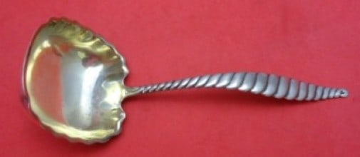 Whiting Oval Twist Sterling Silver Gravy Ladle 6.5 Inch Goldwashed: Whiting Oval Twist Sterling Silver Gravy Ladle 6.5 Inch Goldwashed This exquisite gravy ladle features a classic Oval Twist design by Whiting, crafted from sterling silver with a gold-washed finish. M