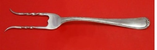 Gorham Newcastle Sterling Silver Baked Potato Fork Custom Made 7 3/8": Gorham Newcastle Sterling Silver Baked Potato Fork Custom Made 7 3/8" Introducing the Newcastle by Gorham Sterling Silver Baked Potato Fork, a beautifully crafted serving fork measuring 7 3/8 inches.