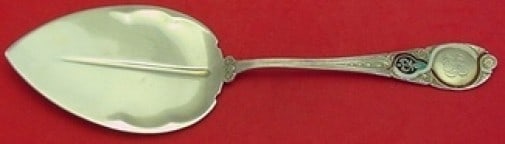 Wendt Moresque Sterling Silver Enameled Pie Server 10 Inch: Wendt Moresque Sterling Silver Enameled Pie Server 10 Inch Elevate your serving experience with this exquisite sterling silver pie server from the Moresque collection by Wendt. This 10" pie server fea