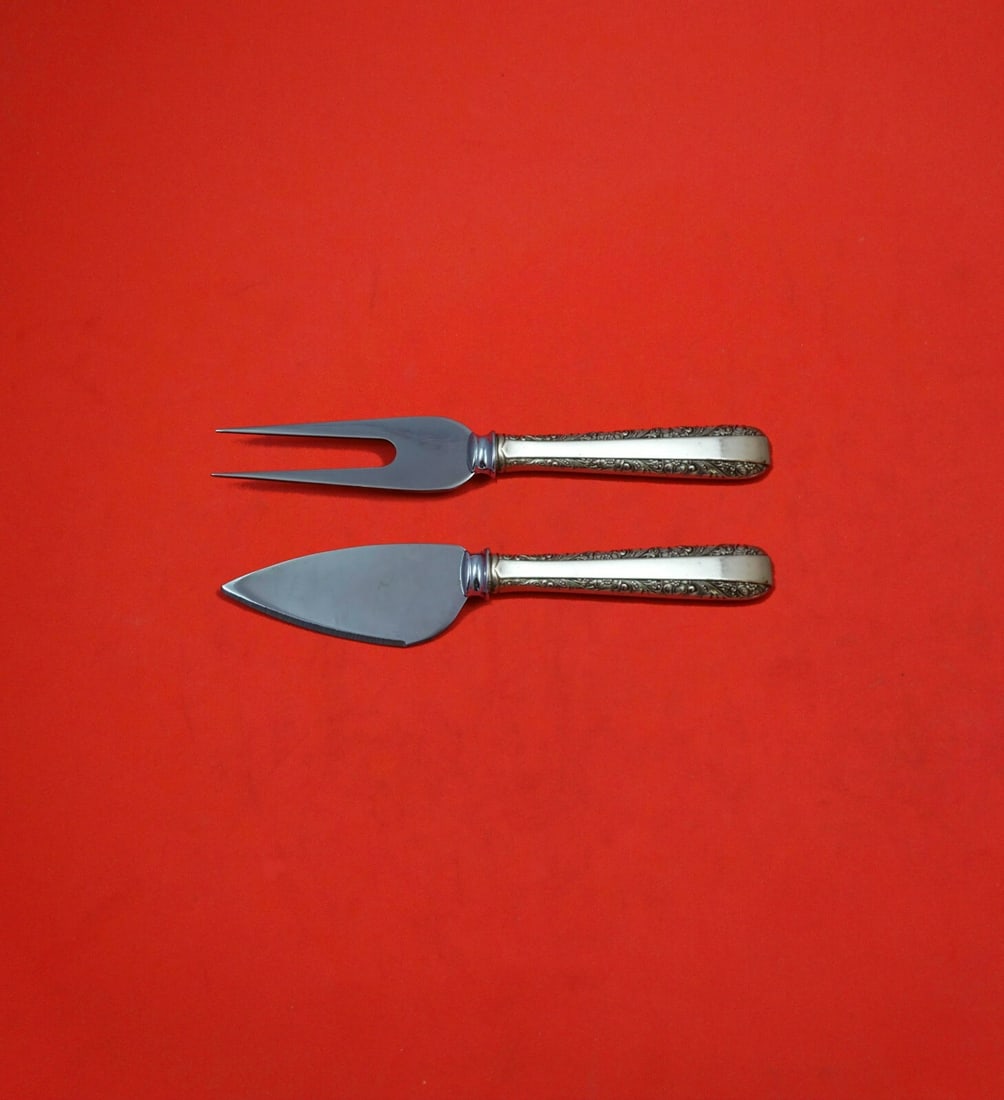 Towle Candlelight Sterling Silver Hard Cheese Serving Set 2-piece: Towle Candlelight Sterling Silver Hard Cheese Serving Set 2-piece Enhance your cheese serving experience with the Candlelight by Towle Sterling Silver Hard Cheese Serving Set. This elegant 2-piece set